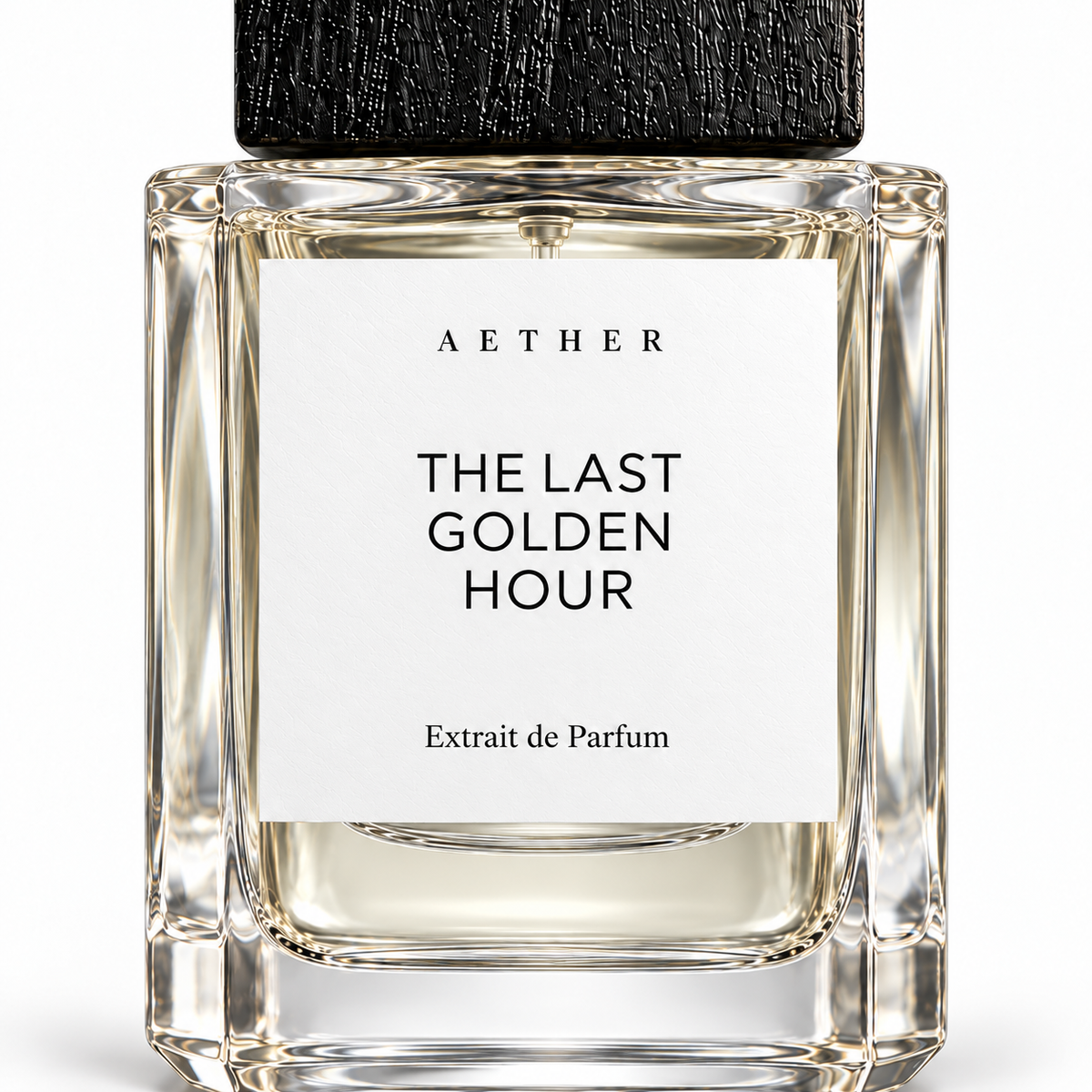 The Last Golden Hour Extrait de Parfum — close detail of the white label, glass and textured black cap