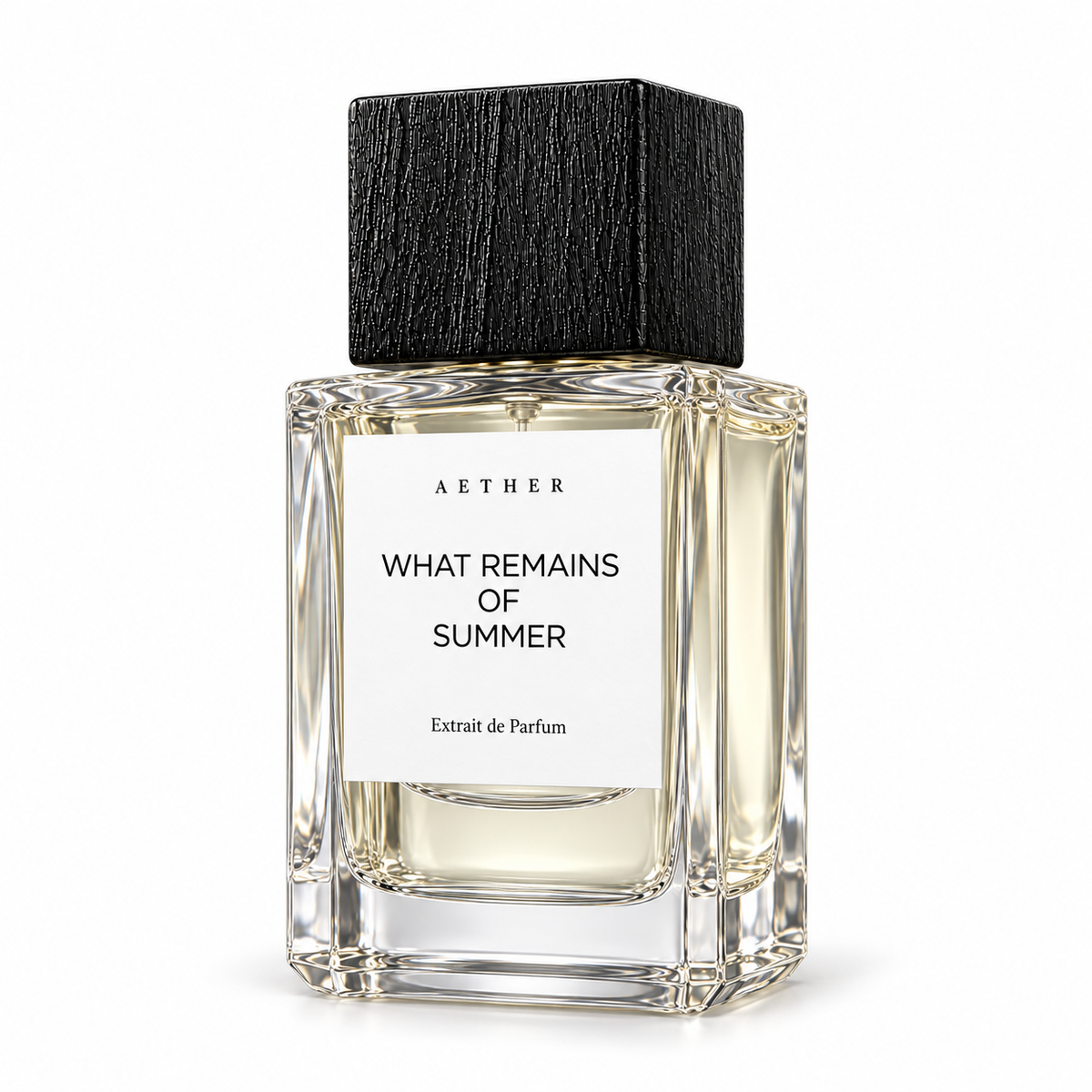 What Remains of Summer Extrait de Parfum — three-quarter view of the white-label bottle